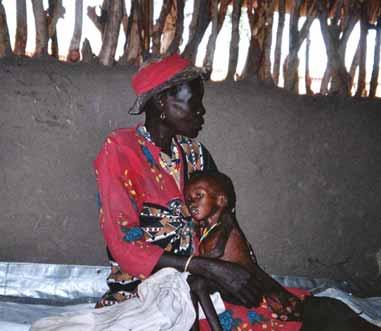South Sudan, Tearfund, 2003. Mother and child with complicated severe malnutrition in Tearfunds stabilisation centre, South Sudan. Ethiopia, Concern, 2003.