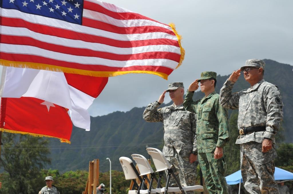 Rendering honors HAWAII NATIONAL GUARD TRAINING INSTITUTE, Hawaii From left, Col. William Prendergrast, commander of the 82nd ROC, Col.
