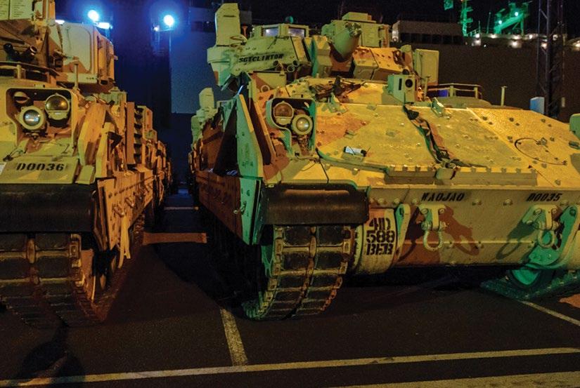 USAREUR RSOI Figure 1-2. A group of Army Bradley Fighting Vehicles from 3rd ABCT/4th ID, wait to be loaded onto a railcar for shipment to Poland at the port in Bremerhaven, Germany, 7 JAN 2017.
