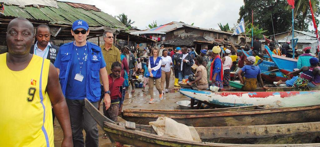 IOM, CDC, and WHO conduct a joint assessment of population mobility, community health event-based surveillance, and border management best practices at a fishing village in Fanti Town, Liberia JOINT