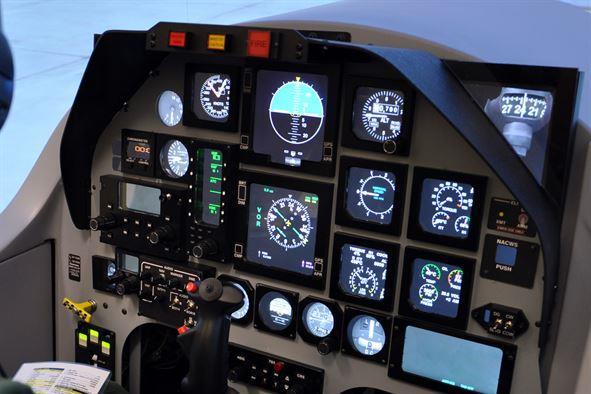 The new T-6 Texan II simulator instrument panel uses a single flat panel monitor and software to recreate the look and feel with digital displays and gauges. (U.S. Air Force photo/staff Sgt.