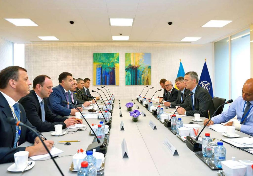 Ukraine s Minister of Defence General Stepan Poltorak (third from left) meets NATO Secretary General Jens Stoltenberg.