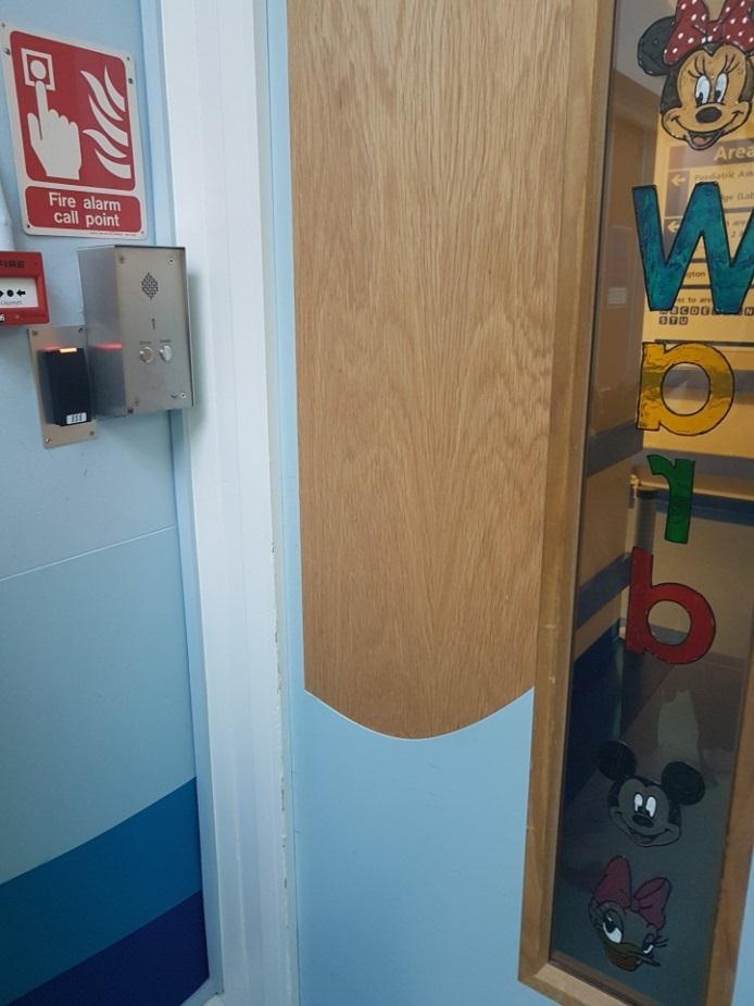 Staff in the paediatric wards have an ID card which allow them to get in and out of those doors by simply scanning it.