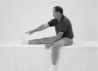 (11) Seated Hamstring Stretch Sit on couch or bed with leg extended.