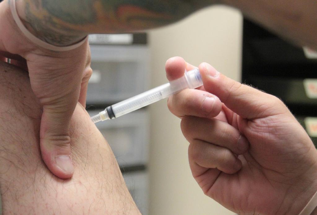Flu vaccinations underway Jan Clark TAMC Public Affairs Officer Tripler Army Medical Center-Members of the Joint Vaccination Working Group, or JVWG, which consists of individuals from each service,