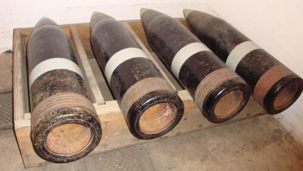 Below are four 10-inch armor piercing projectiles