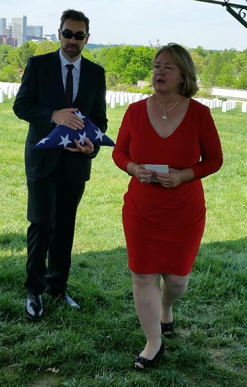 Chuck s widow, Lynn Elsasser, received the ceremonial flag.