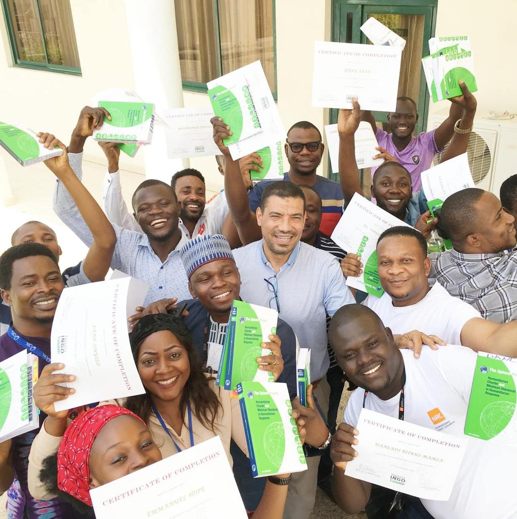 73 FRONTLINE AID WORKERS TRAINED IN 10 LOCATIONS IN BORNO STATE NIF/Andrew Saman Staff of INGOs and NNGOs with their certificates after undergoing SPHERE minimum standards training organised by NIF
