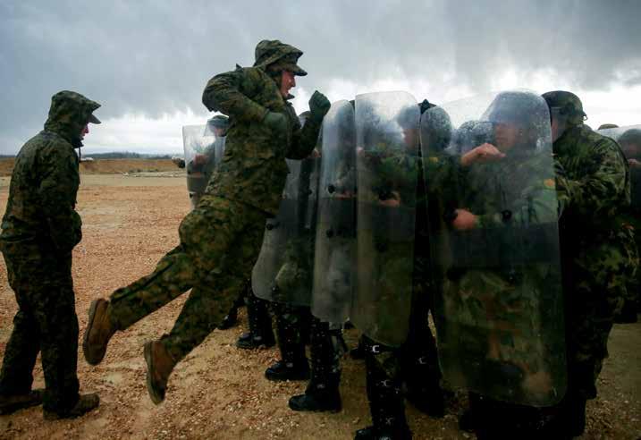 Marines attempt to break through wall of Bulgarian and Serbian soldiers during riot control course of Platinum Wolf 15 at South Base, Serbia, November 19, 2015 (U.S. Marine Corps/Derrick Irions) for Operations.