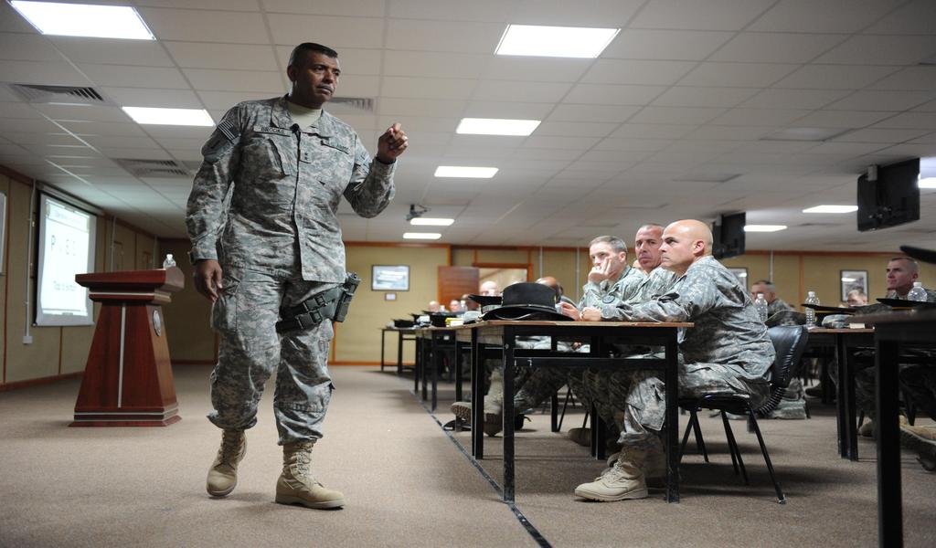 U.S. Army Maj. Gen. Vincent Brooks, Commander, with 1st Infantry Division conducts a briefing in Counter Insurgency Stability Operation Center (COINSOC), Baghdad, Iraq, September 2, 2010.