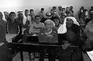 U.S. Army, CPT Thomas Breslin Students in class on first day of school on 26 January 2007, in Ar Ramadi, Iraq.