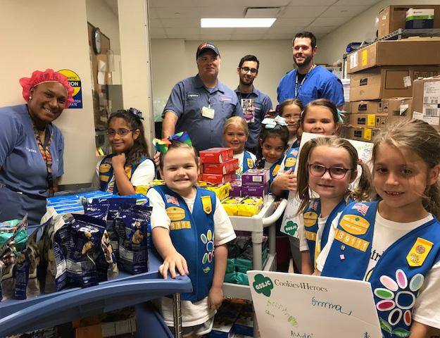 Girl Scouts visit League City Hospital Emergency Department League City Girl Scouts Troop 139111 visited UTMB s League City Hospital Emergency Department June 29th with cookies in tow to thank the