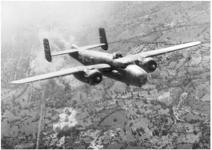 9. B-25 following bombing mission in Kinu, Burma. 2 November 1944. A North American B-25 of the 81 st Bombardment Sq.