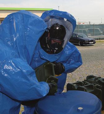 Personnel from 7th Civil Support Command (CSC) conduct clean operations dealing with the removal of chemicals during a training exercise. Seventh CSC supports U.S. Army Europe and Seventh Army.