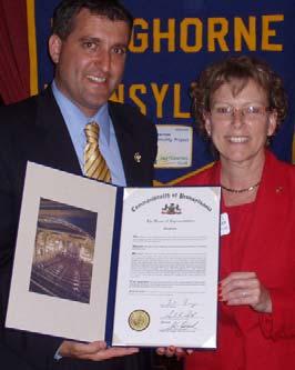 State Representative Frank Farry presented president Cheryl Kauffman a citation from the House of Representatives honoring all the Club's contribution to the welfare of people in the local area as