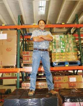 generosity of time and leadership Hawaii Foodbank Equipment improvements forklifts Gary North Qualified forklift driver Paul Taaga starts to demonstrate the lift s ability to reach five-levels high.