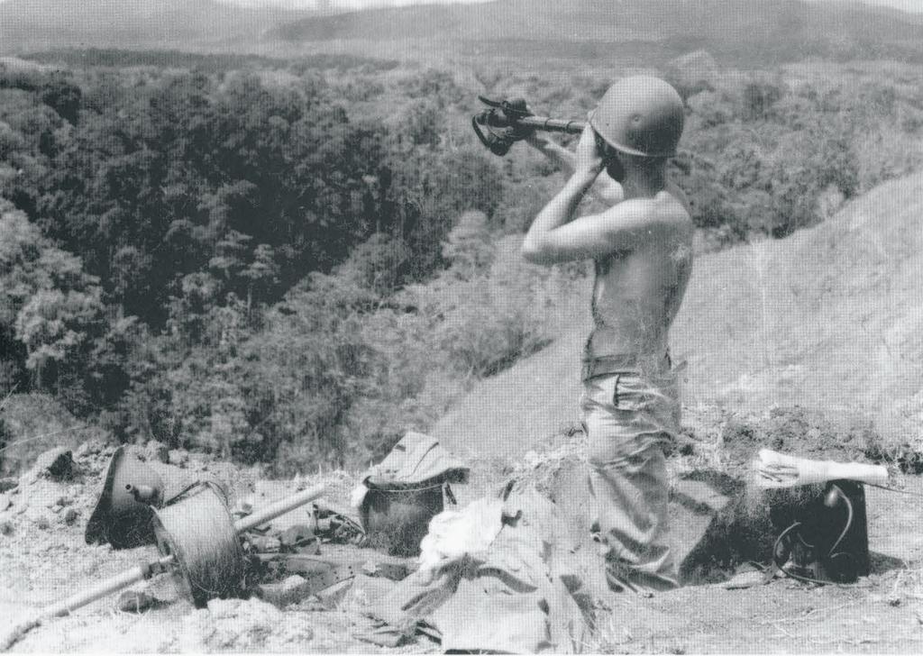 A U.S. Marine guards Hill 80 on Edson s Ridge (also known as Bloody Ridge), Guadalcanal, in 1942.