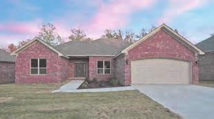Kitchen w/tile counter tops, backsplash & pantry. Lg, master BR w/tray ceiling, master BA w/jetted tub, his/her sinks & sep. shower. Fenced backyard has patio, deck & 12x20 storage bldg.