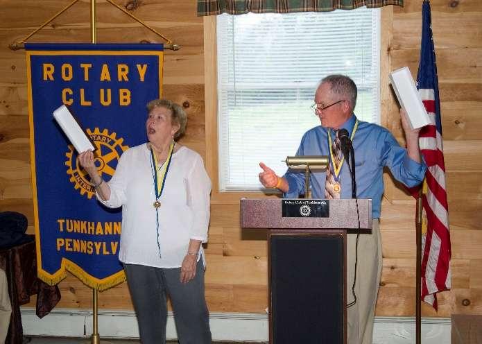 Page 9 Rotary Club of Tunkhannock Tunkhannock President Ron Furman found the gavel box empty (left) when he proceeded to pass the gavel box to incoming President Ann Way.