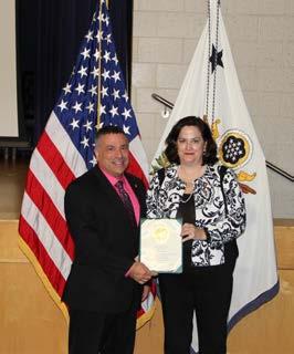John Pellegrino was presented with a certificate and a pin in recognition of 35 years of service in the Government of the United States of America.