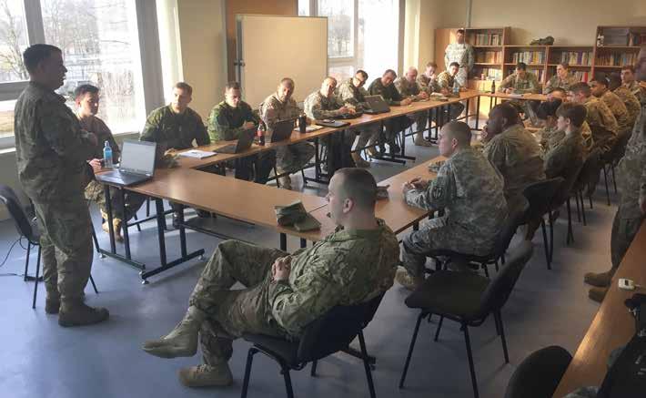 Capt. Robert Yauger speaks at the Strong Europe Movement Conference at the close of 624th Movement Control Team s Atlantic Resolve rotation. (Photo by 1st Lt.