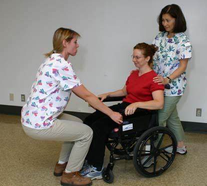 the word SLIDE - Count 1-2-3 SLIDE - On SLIDE, front caregiver uses own knees to push against resident s knees while back caregiver guides resident s pelvis (as below) to back of chair - Resident