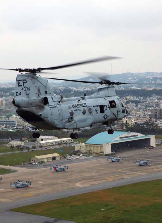 Reece Lodder A CH-46E Sea Knight helicopter makes its last flight Nov. 26 over Marine Corps Air Station Futenma.