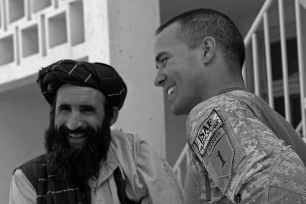 Courtesy of Author CPT Trevor Voelkel, C Company, 2nd Battalion, 2nd Infantry Regiment commander, with an Afghan local leader in Kandahar Province, September 2008.