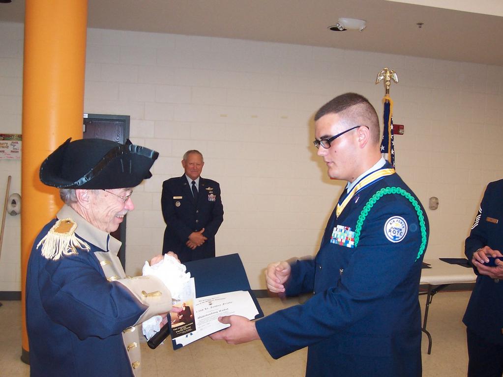 2014 page 10 Josh Frisby, winner of the chapter JROTC Outstanding Cadet Neck Ribbon and medal.