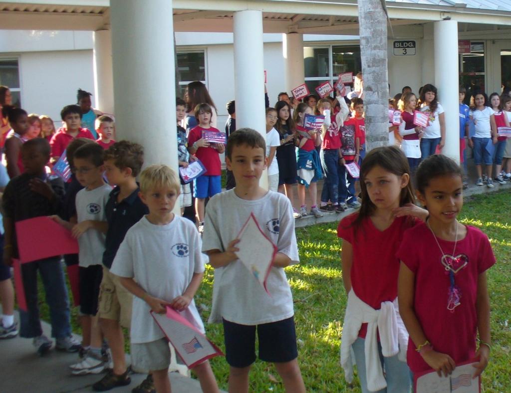 Kindergarten students from Silver Ridge Elementary School in Davie dressed in red, white and blue and gave a