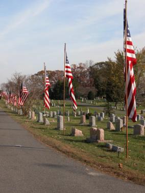 C. "Barney" Barnum. Jr., USMC (Retired). The Avenue of Flags (64 veteran casket flags) will be displayed from dawn to dusk at the Chestnut Grove Cemetery.