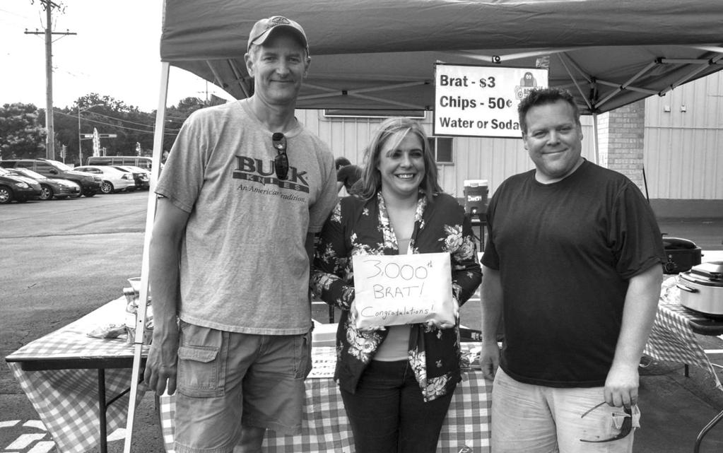 VOLUME 39 ISSUE 2 AUGUST 2017 Pictured is Crystal who purchased the 3,000th brat, and won a prize package. She is pictured with ACCESS board member, Stan, and ACCESS assistant director, Jason.