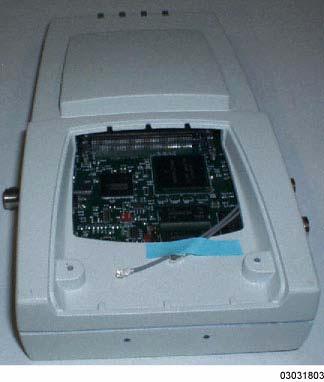 Remove the Airespace AP door. Note that the 1200B has two RF cable ends taped to the inside of the case, one labeled 1 and the other labeled 2.