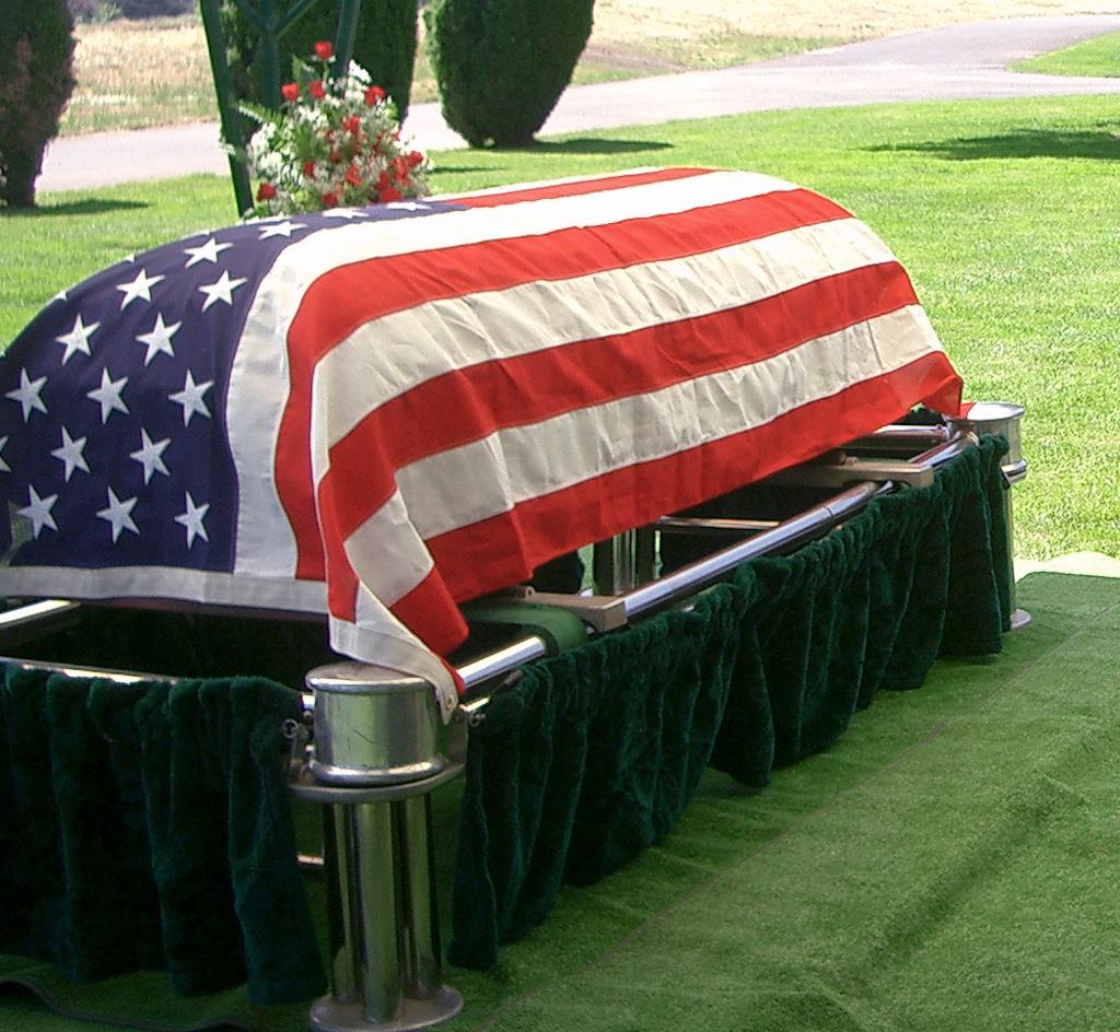 Flag-draped Casket Prominent in a military funeral is the flag-draped casket. The blue field of the flag is placed at the head of the casket, over the left shoulder of the deceased.