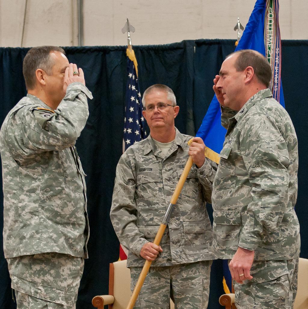 Airmen recite the Airmen s Creed during Chief Master Sgt. Randy Miller s assumption of authority to the rank of command chief master sergeant. (Photo by Tech. Sgt. Theodore Ramsey) Col.
