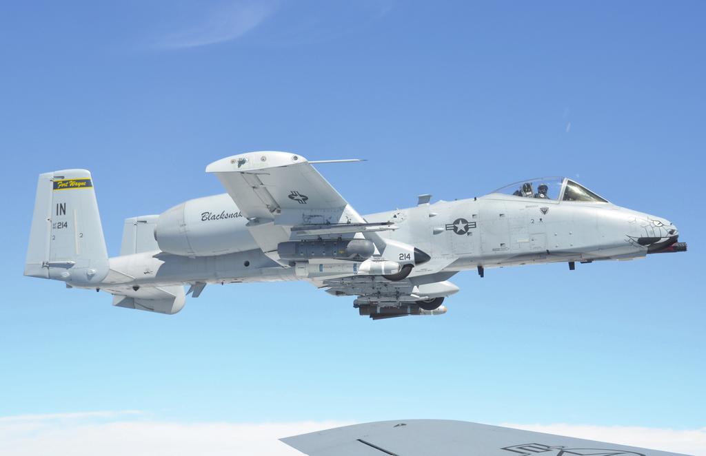 A-10 Flies High Over Hoosier Country A-10 Thunderbolt II aircraft with the 122nd Fighter Wing flies alongside a KC-135 Stratotanker with Grissom Air Reserve Base during an air refueling mission, Aug