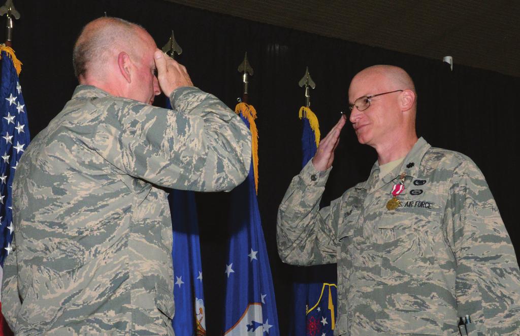 Meritorious Service Medal Awarded U.S. Air Force Colonel Christopher Colbert (right), commander, 181st Mission Support Group presents Lt. Col. Sean Stephens (left) the Meritorious Service Medal during a change of command ceremony, Aug.