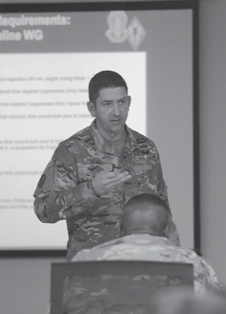 Discipline and fitness Commanders discuss building better Soldiers By ROBERT TIMMONS Fort Jackson Leader Photo by ROBERT TIMMONS Lt. Col. Adam Lewis briefs Maj. Gen.