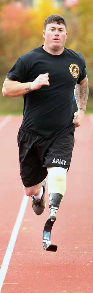 A WTB E Soldier in transition runs on a track in Germany.