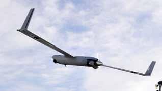 Right: In an early trial by the Royal Canadian Navy in 2009, the ScanEagle UAV flies for the first time from the deck of a Canadian warship.