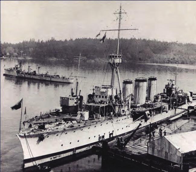 HMC Ships Aurora (foreground) and Patriot and Patrician in Esquimalt Harbour, circa 1921. 1928 Patrician and Patriot were replaced by Champlain (ex-hms Torbay) and Vancouver (ex-hms Toreador).
