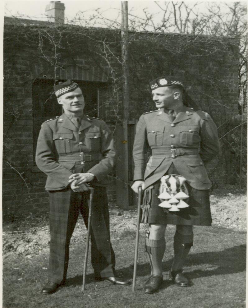 VOLUME 16, ISSUE 3 (2015) Major Ross Ellis (on the right) Major Ross Ellis, (pictured here on the right) had just shortly before been promoted to acting commander of the Calgary Highlanders.