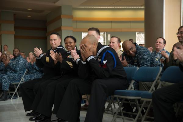 Aviation Boatswain's Mate (Launching and Recovery Equipment) First Class (ABE1) Ronell Day reacts after learning he won NAVAIR's 2016 Sailor of the Year.