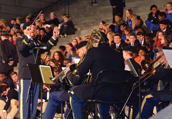 Tis the season Above, Fort Jackson s 282nd Army Band provides accompaniment Monday evening for the annual Governor s Carolighting celebration at the South Carolina Statehouse.
