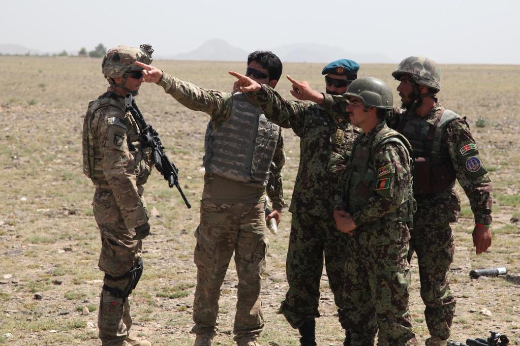 U.S. Army Soldiers from Easy Company, 2nd Battalion, 506th Infantry Regiment, 4th Brigade Combat Team, 101st Airborne Division, and Afghan National Army 2nd Khandak, 1st Brigade, 203rd Corps, conduct