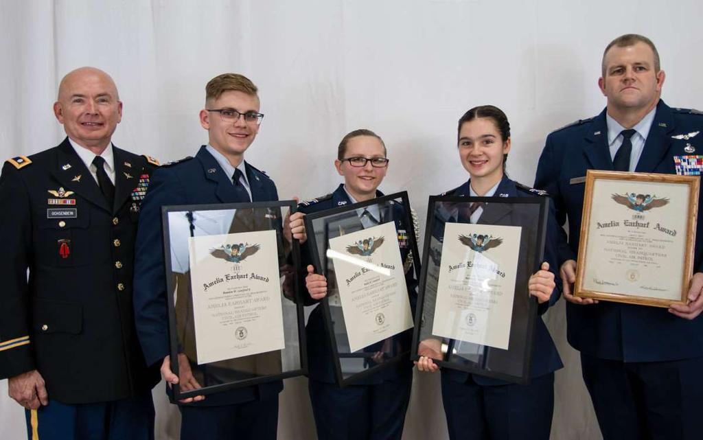 Top: (L-R), retired Army Col. Mark Ochsenbein with Soldier s Wish; Cadets Brandon Lunsford Jr., Bailey Lunsford, and Bethany Wilson; and Col.
