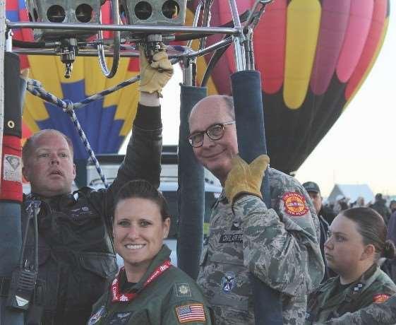 Above: In the gondola, (L-R) Lt. Col. William R. Fitzpatrick, Maj. Jessica Makin, and New Mexico Wing Commander Col. Mike Lee about to rise in the final Mass Ascension of the Fiesta.