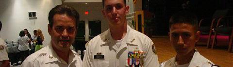 Cadet Adam Firpo from NOVA High School receives his ROTC Medal, also present was last