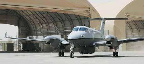 USAF photo by SrA. Tiffany Trojca The first MC-12W to arrive in-theater taxis out of its hangar at Joint Base Balad, Iraq, on the way to its first combat sortie June 10.