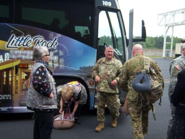 Mary Ellen and Linda stood at the door of the bus and thanked the soldiers for their service and